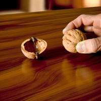 Surprising Secret to fixing a scratch on a solid walnut table… use a fresh walnut!